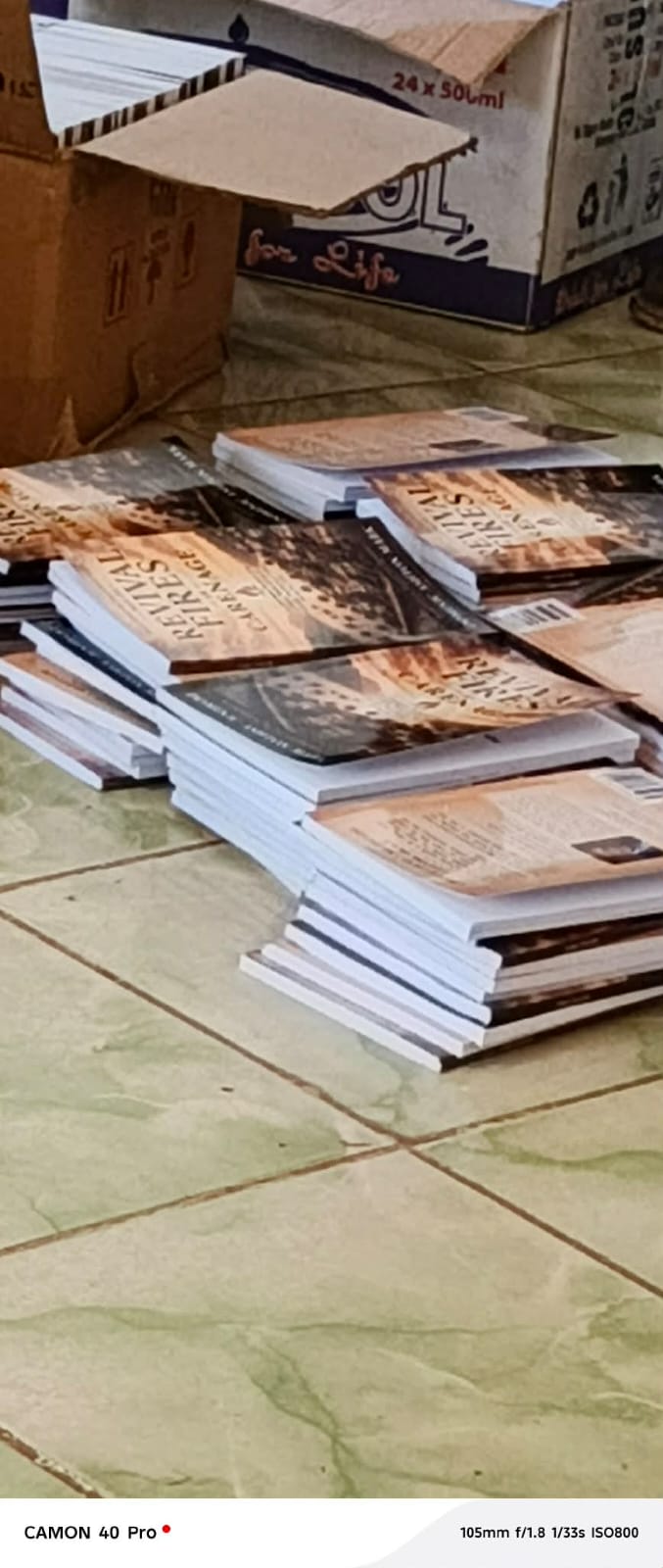 Printed copies of Revival Fires in Carenage, Second Edition, prepared for East Africa distribution in Kenya